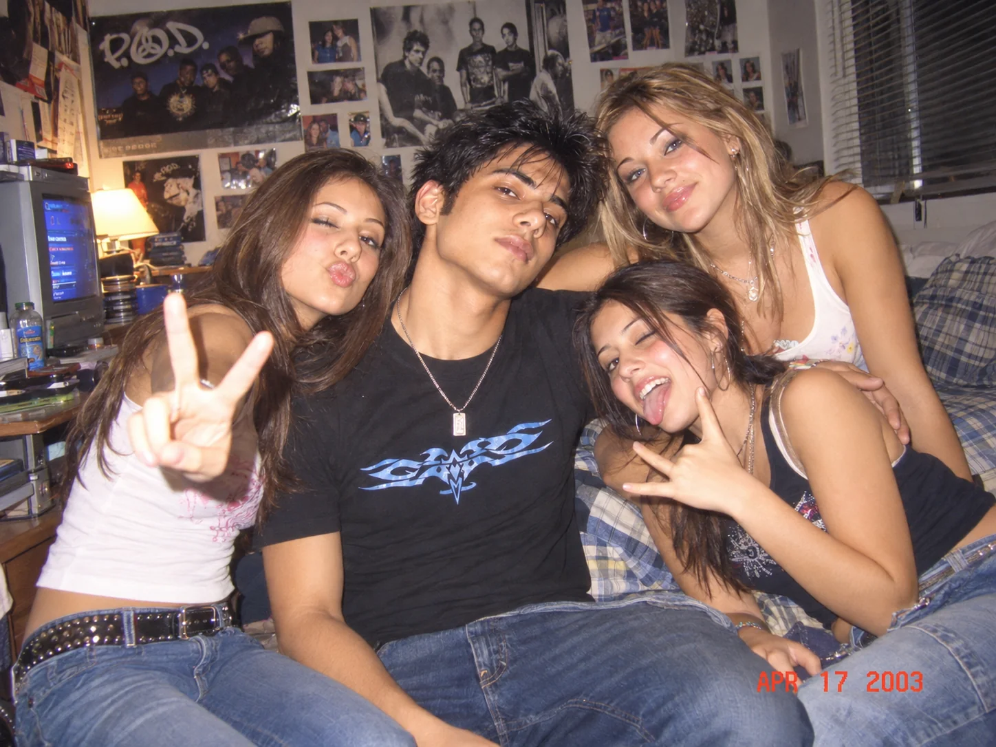 Y2K best friends photo with direct flash, nostalgic poses, and early 2000s digital camera style