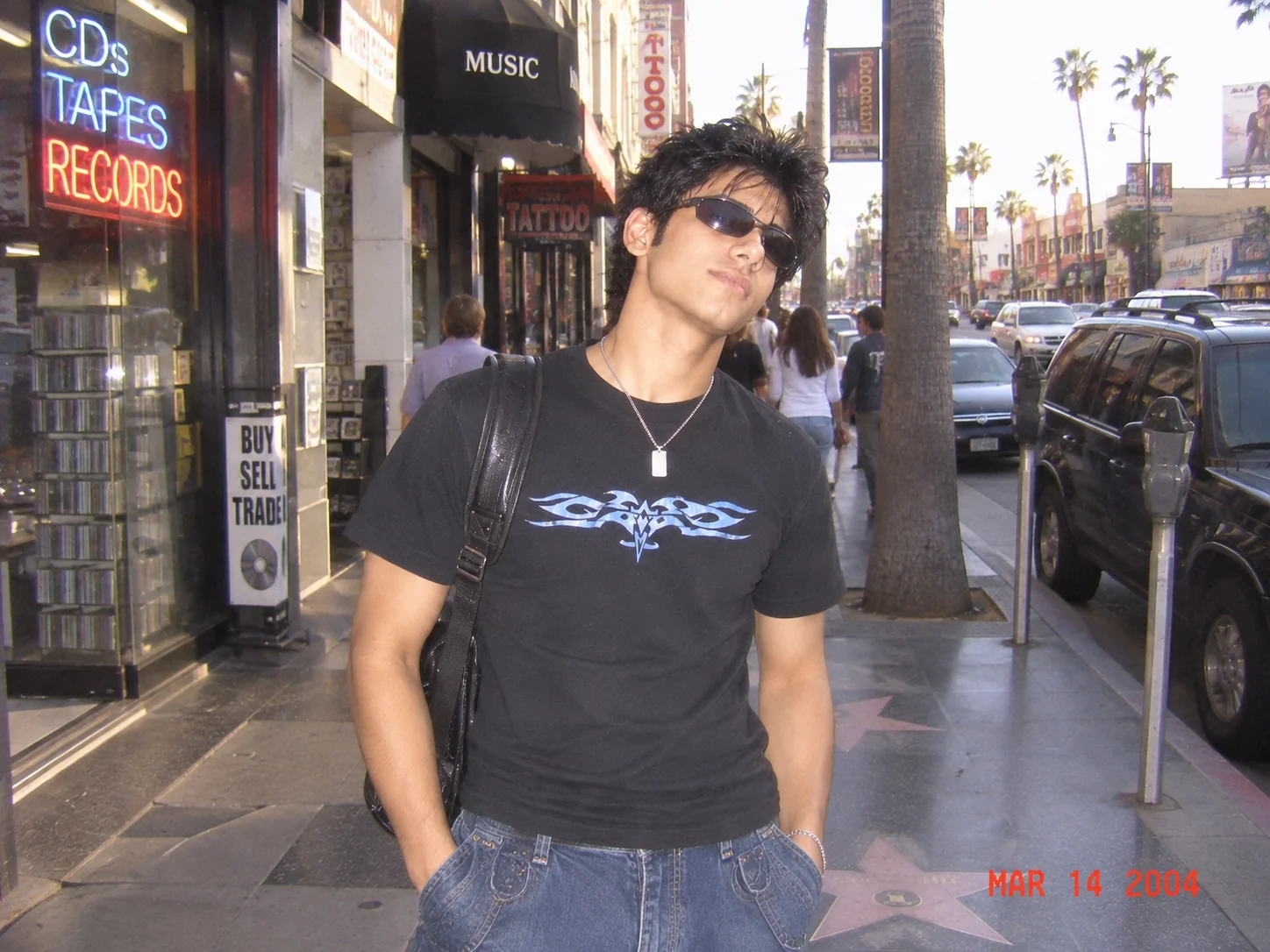 Y2K streetwear candid portrait with early 2000s fashion and direct flash photography